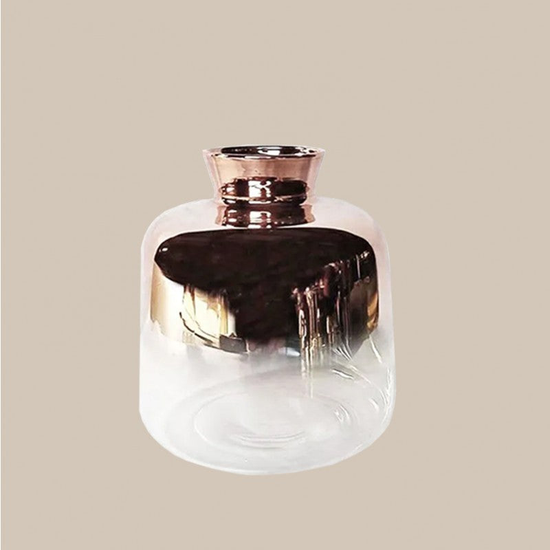 florero de vidrio y cobre